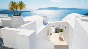 White houses overlooking ocean in Santorini Greece